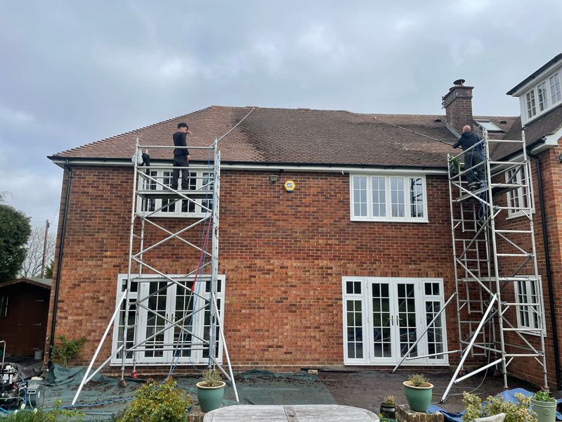 Roof cleaning carried out safely from scaffold towers by The Roof Moss Cleaners in Bovingdon
